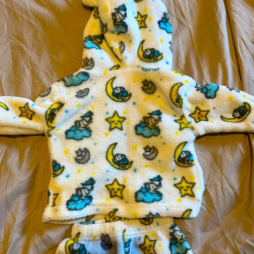 Winter baby pajamas. It has a hood and button up top. Very cozy and soft.